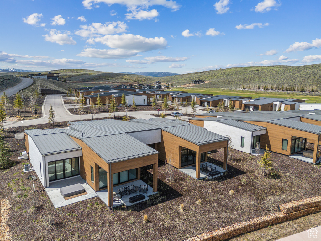 Aerial perspective of suburban area featuring mountains