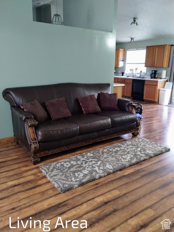 Living area with wood finished floors