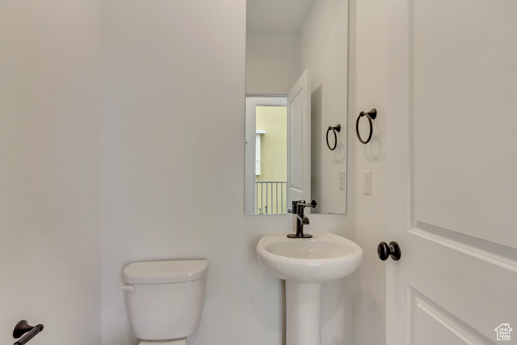 Bathroom with toilet and a sink