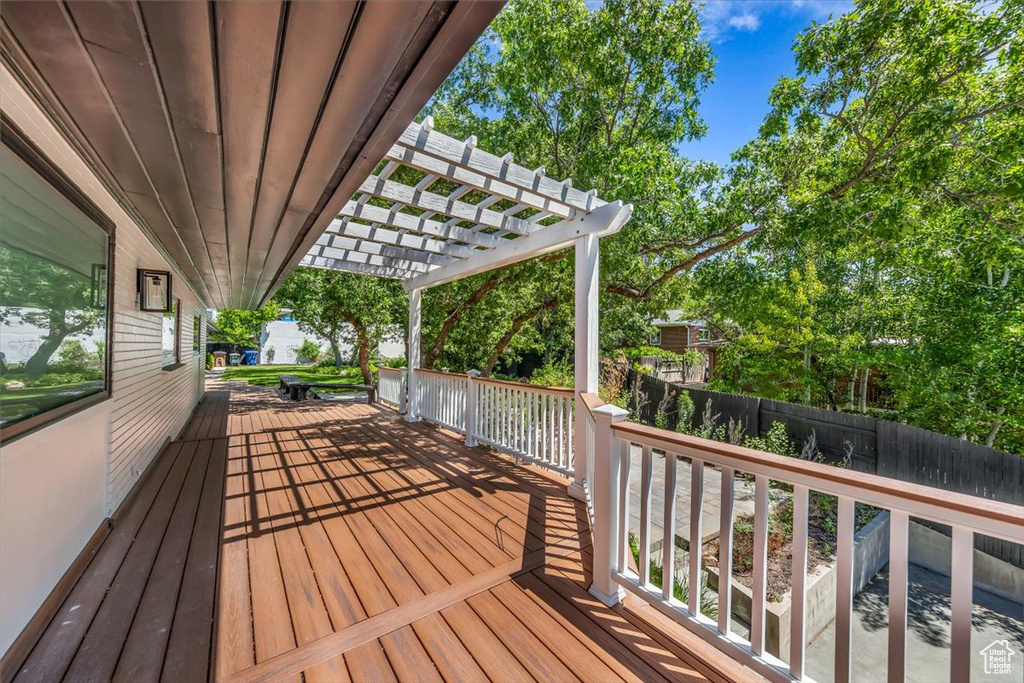 Deck featuring a pergola
