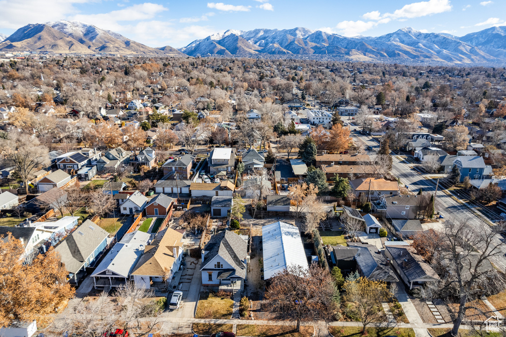 Birds eye view of property with a mountain view