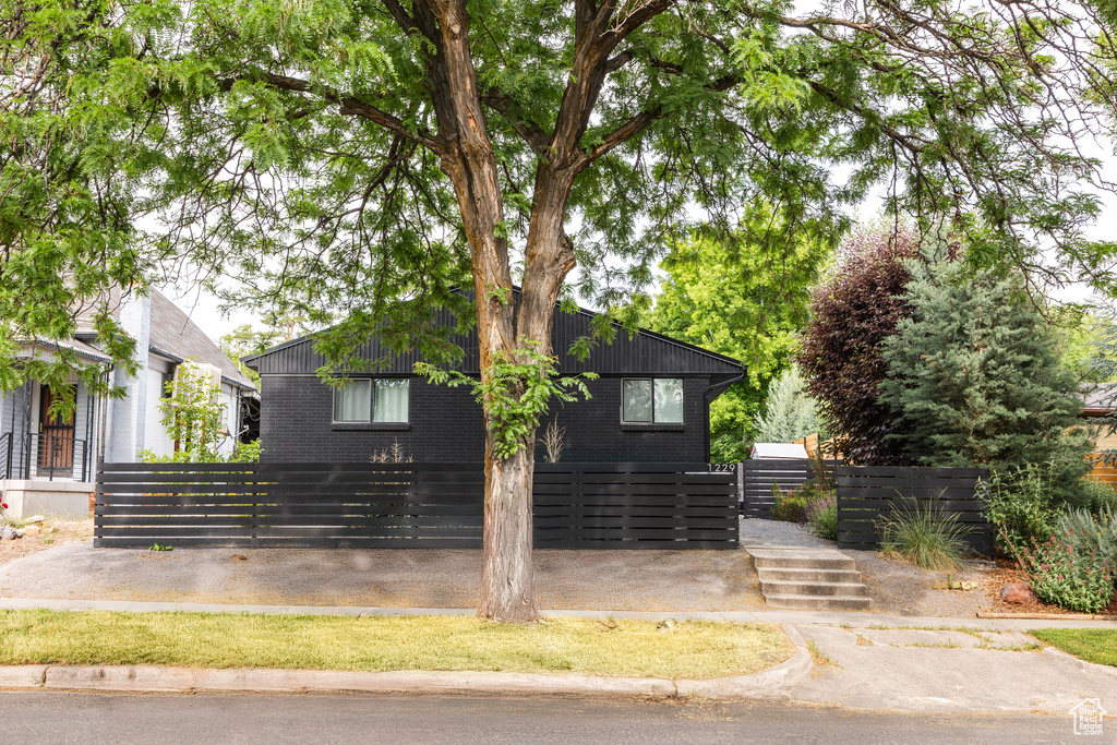 View of front of house with brick siding