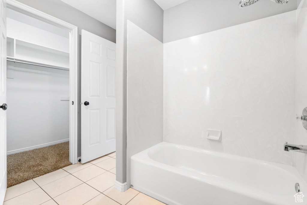 Bathroom with tile patterned flooring