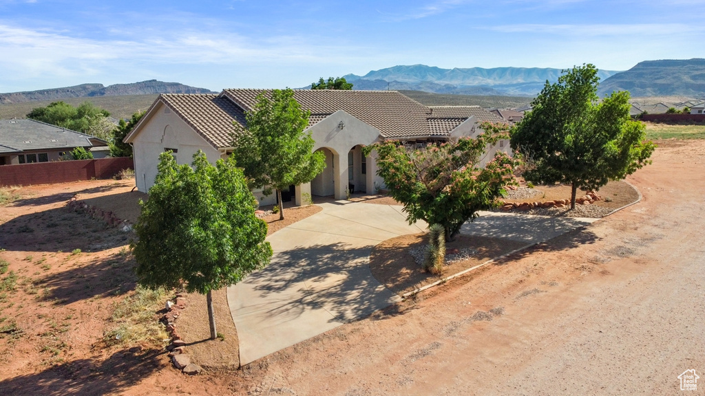 View of front of property featuring a mountain view