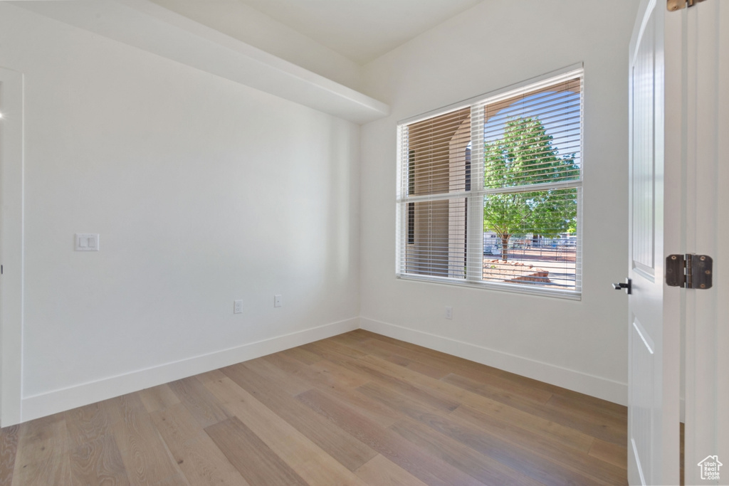 Spare room with light hardwood / wood-style flooring