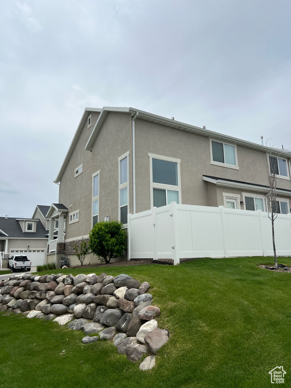 View of home's exterior featuring stucco siding