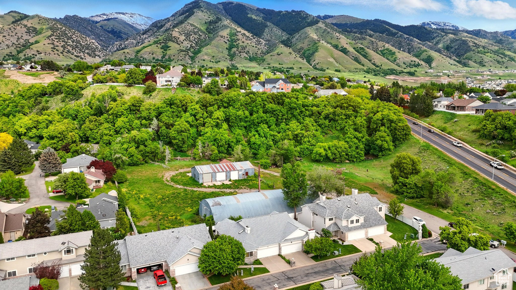 Aerial view of residential area with a mountainous background