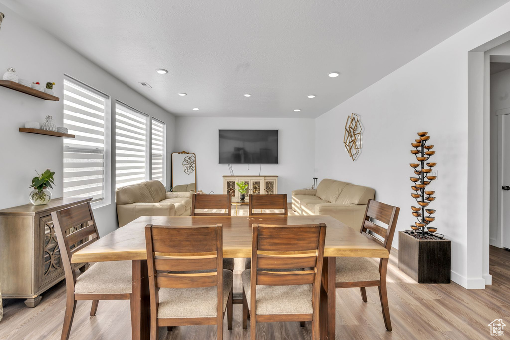 Dining area featuring light wood-type flooring