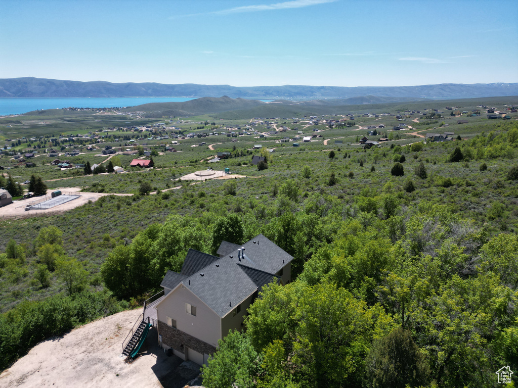 View of subject property featuring mountains
