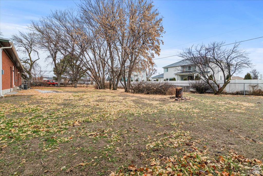 View of yard with central AC unit