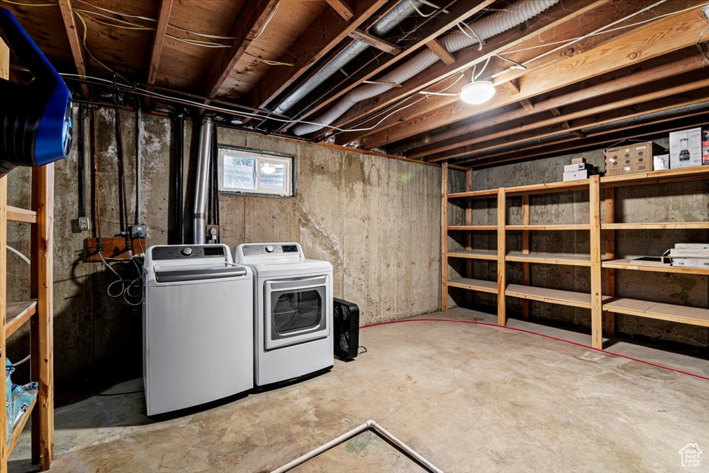 Basement featuring independent washer and dryer