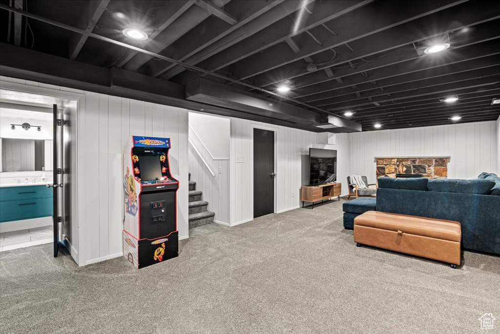 Basement featuring carpet flooring