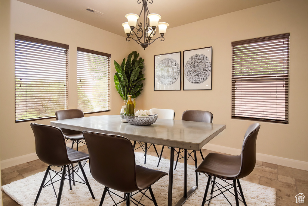 Dining area featuring an inviting chandelier
