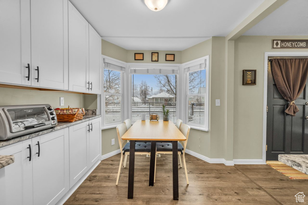 Dining room featuring dark hardwood / wood-style flooring