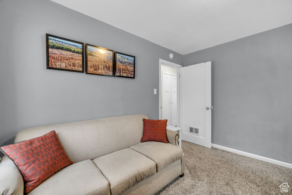 Living room featuring carpet flooring