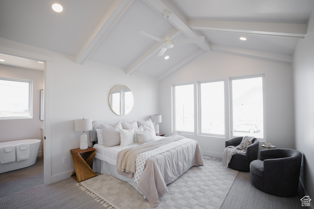 Bedroom with vaulted ceiling with beams and ceiling fan