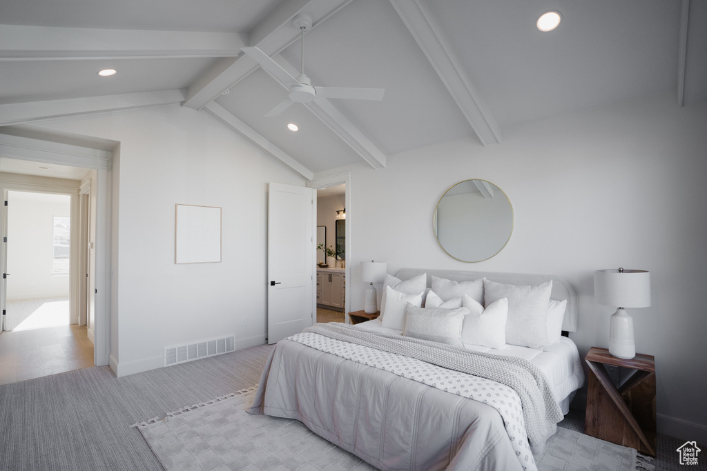 Bedroom with vaulted ceiling with beams, ensuite bathroom, and ceiling fan