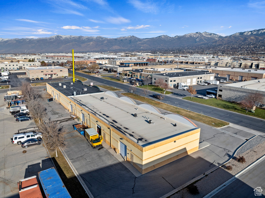 Birds eye view of property with a mountain view