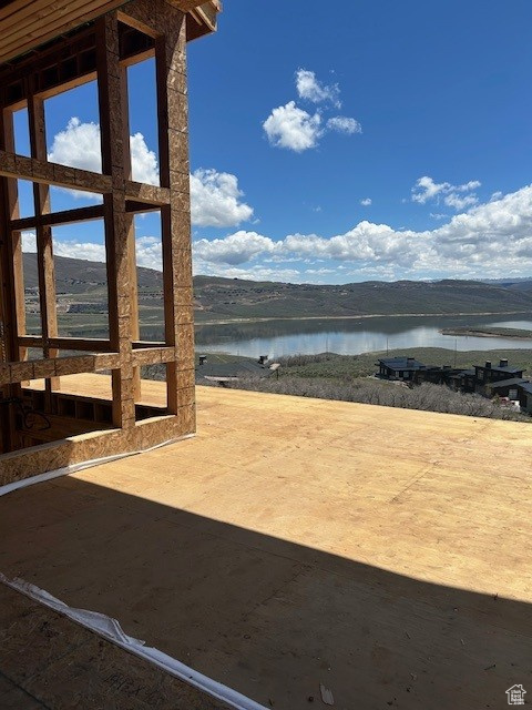 View of patio / terrace featuring a water view