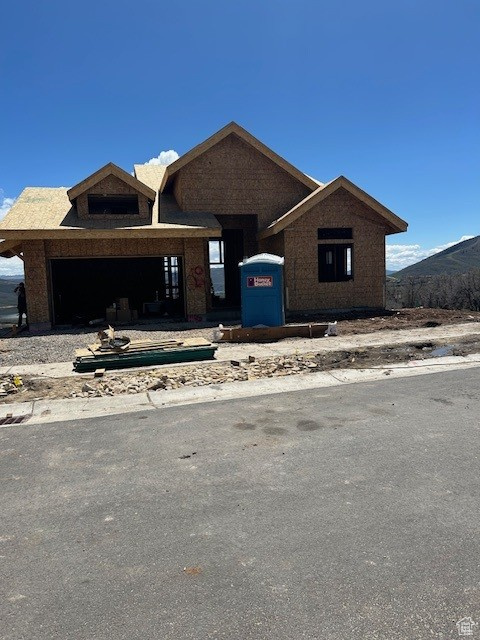 View of front of house featuring a mountain view