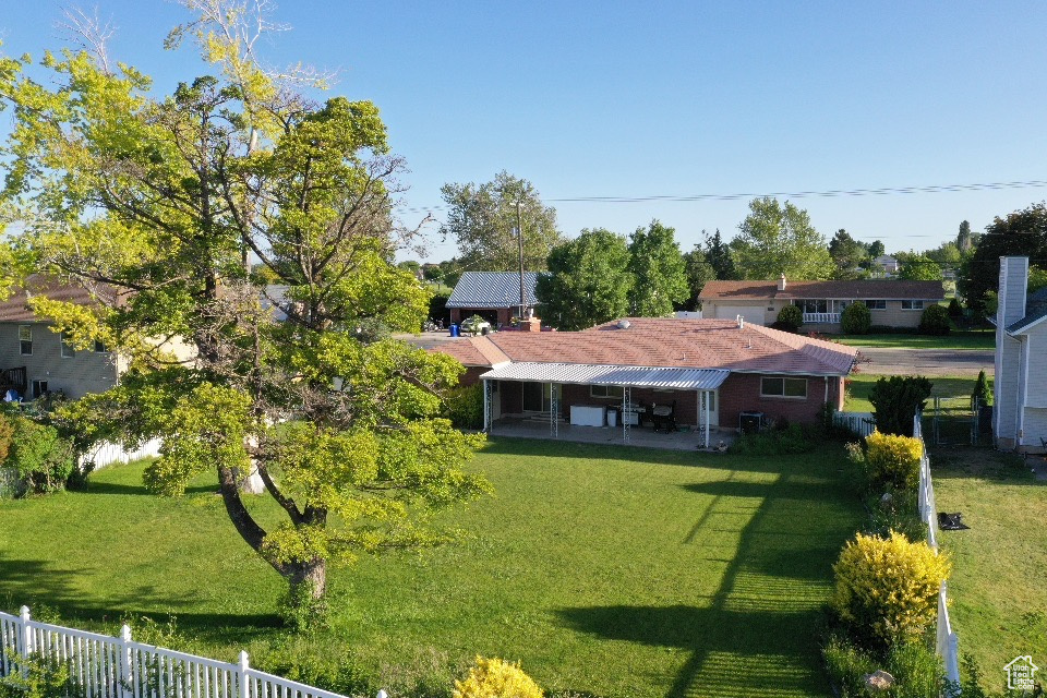 View of yard with a patio