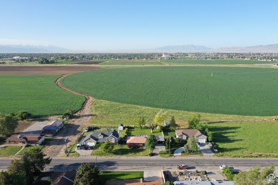 View of property location featuring rural landscape, abundant farmland, and a mountain backdrop
