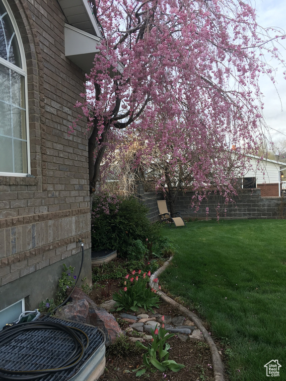 View of yard with central AC unit