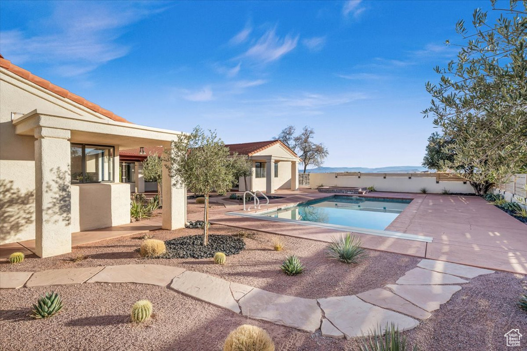 View of pool with a patio area