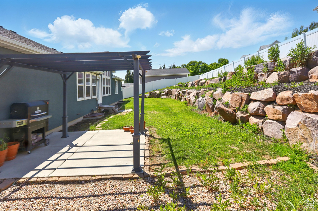 View of yard with a patio