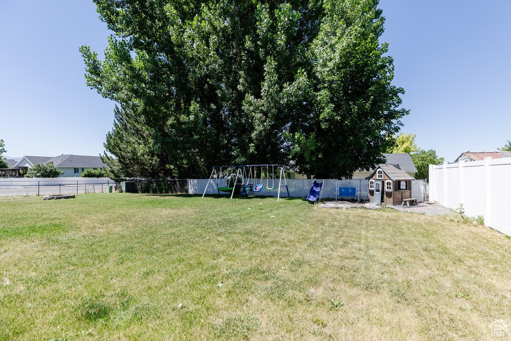 View of yard featuring a playground