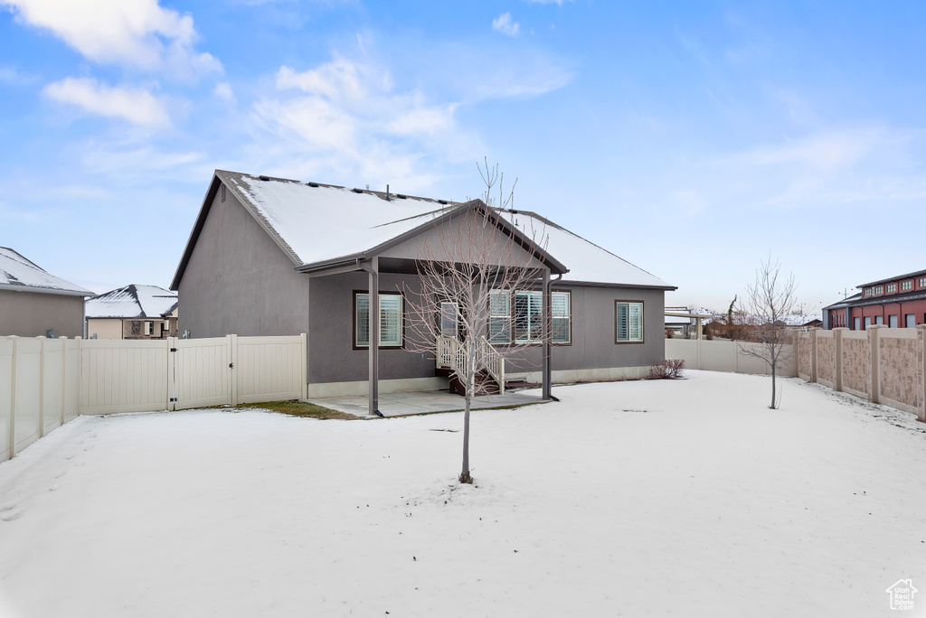 View of snow covered property