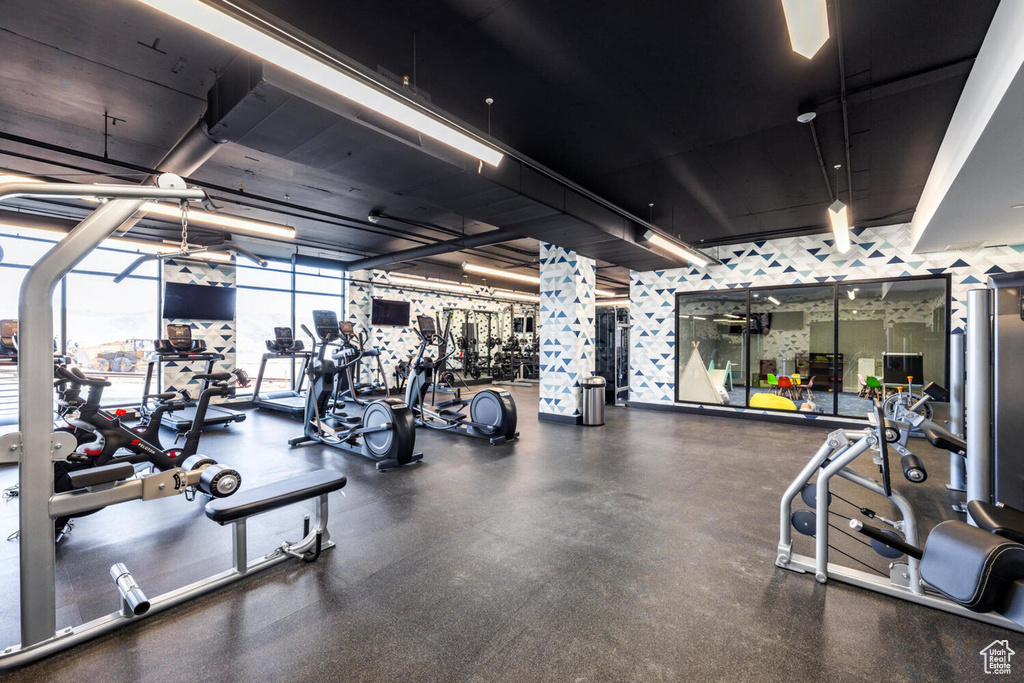 Gym with floor to ceiling windows