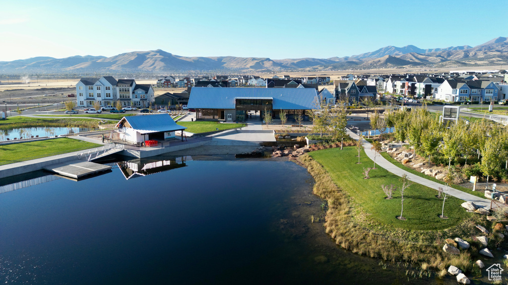 Bird\'s eye view with a water and mountain view