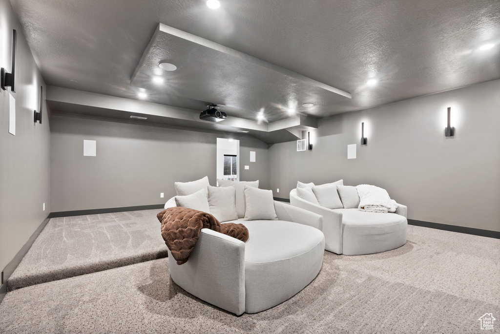 Home theater featuring carpet