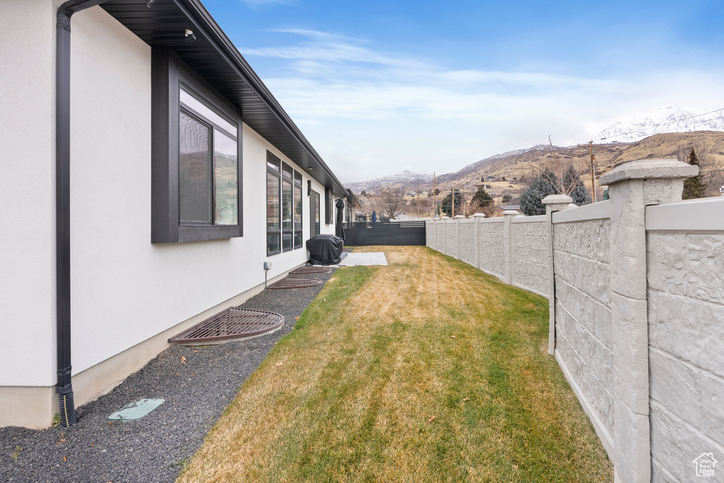 View of yard with a mountain view