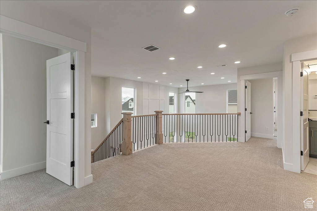 Interior space with light colored carpet