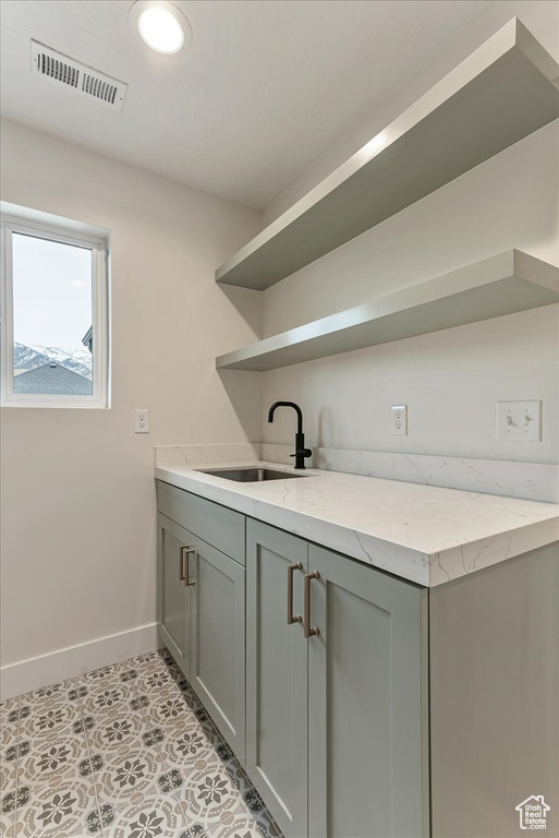Laundry area featuring sink