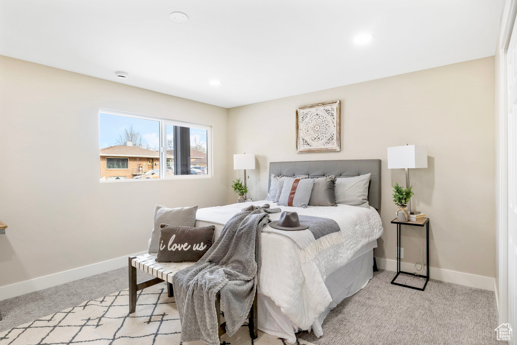 Bedroom featuring carpet floors, baseboards, and recessed lighting