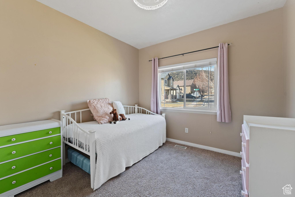 View of carpeted bedroom