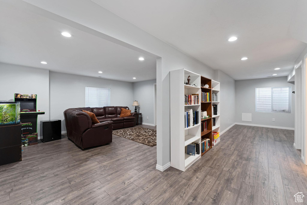 Living room with hardwood / wood-style flooring