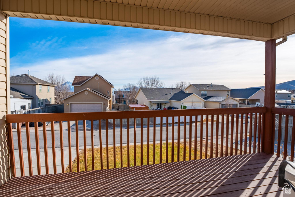 Wooden terrace with a garage