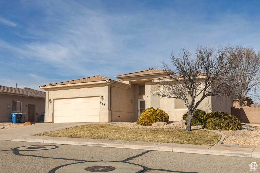 View of front of house with a garage