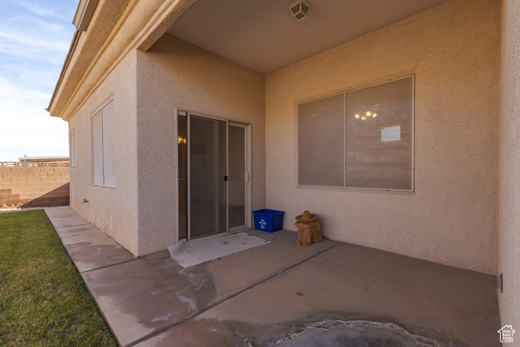 Entrance to property with a patio area