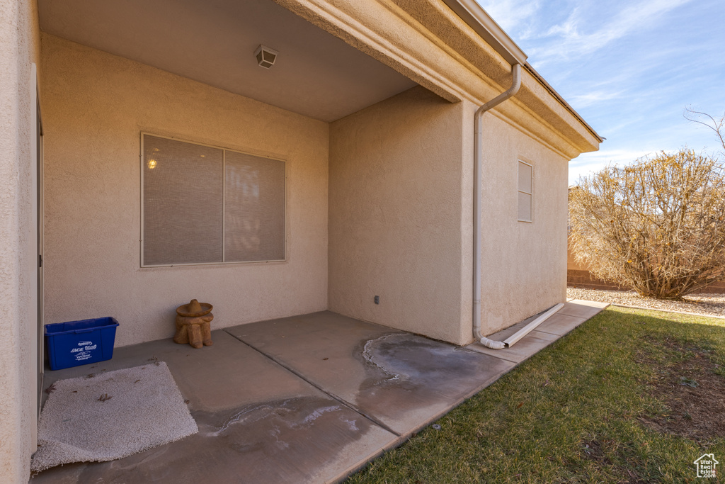 Doorway to property with a patio