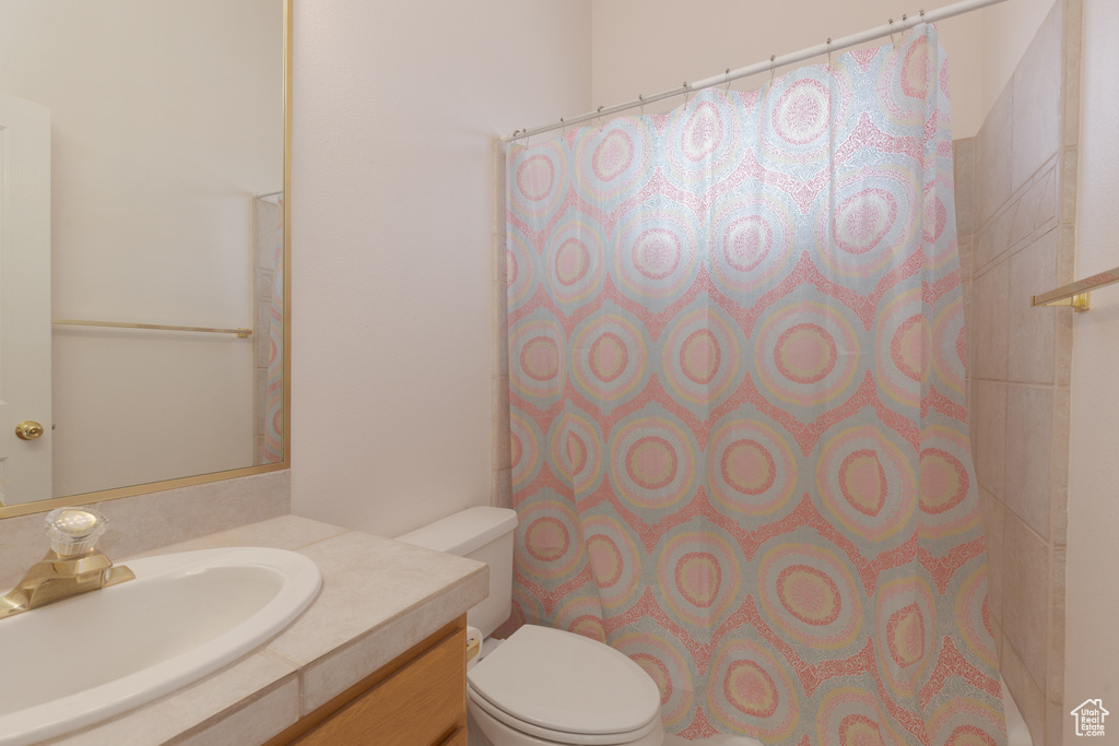Bathroom with vanity and toilet