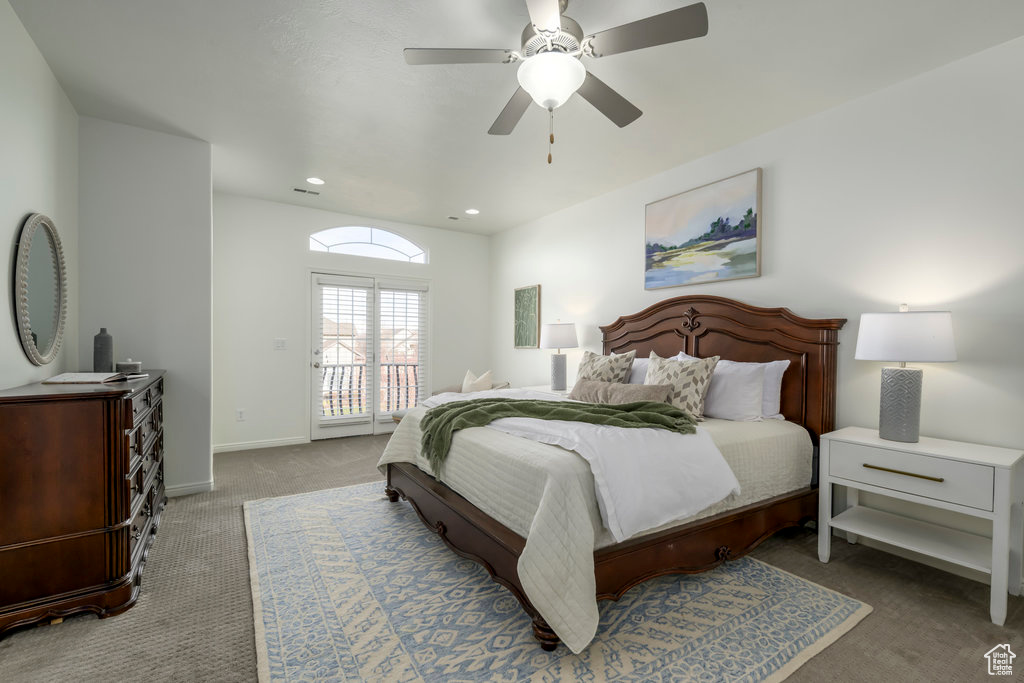 Bedroom with light carpet, access to exterior, and ceiling fan