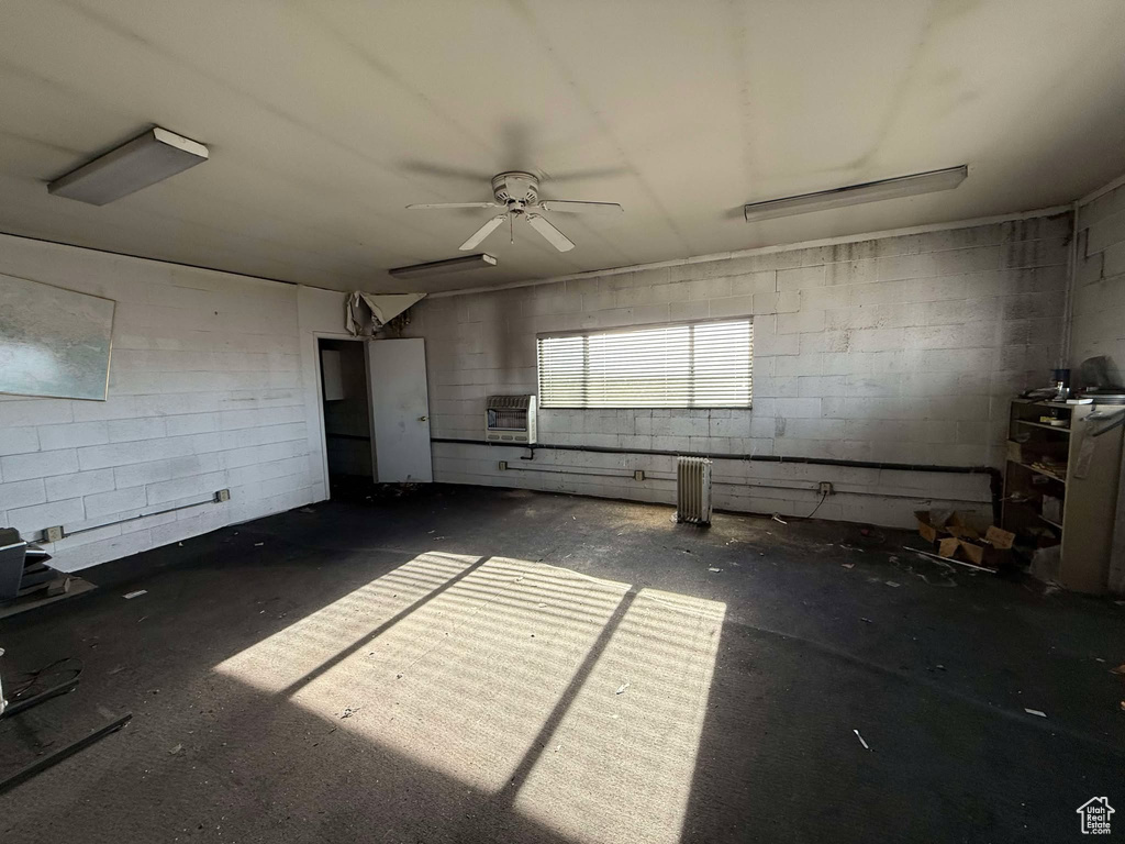 Kitchen featuring ceiling fan and heating unit