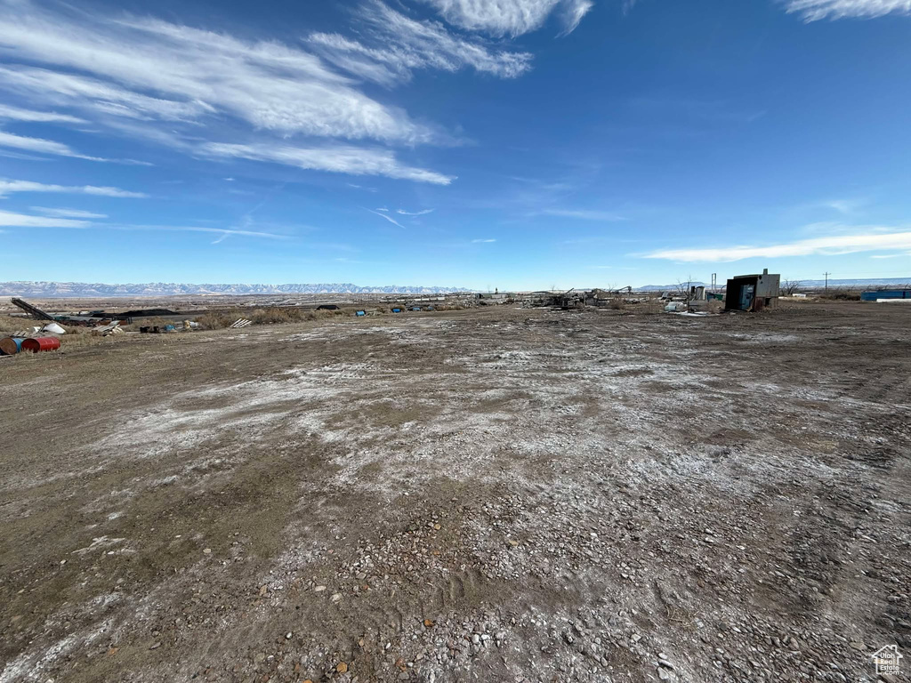 View of yard with a rural view