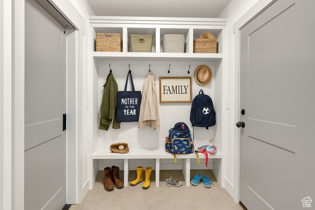 Mudroom featuring tile patterned flooring