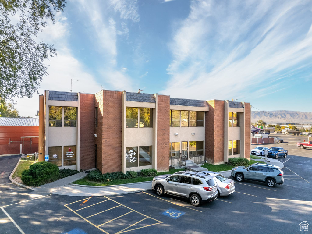 View of building exterior featuring a mountain view